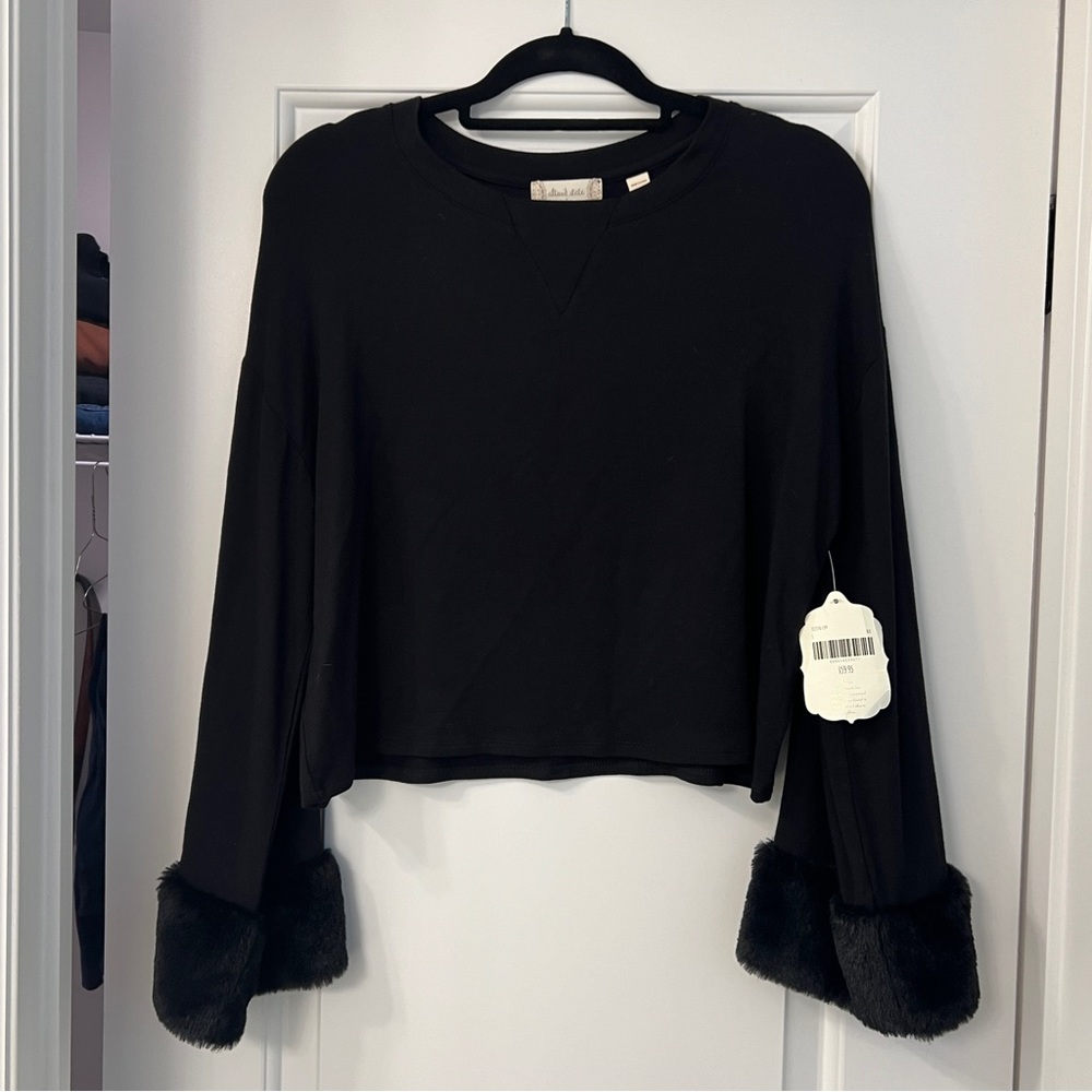 Women’s fuzzy sleeve sweater